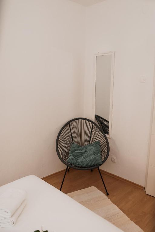 Posteľ alebo postele v izbe v ubytovaní Apartmani Rafaela