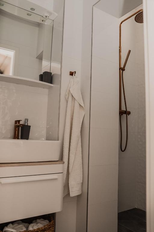 Kúpeľňa v ubytovaní Apartmani Rafaela