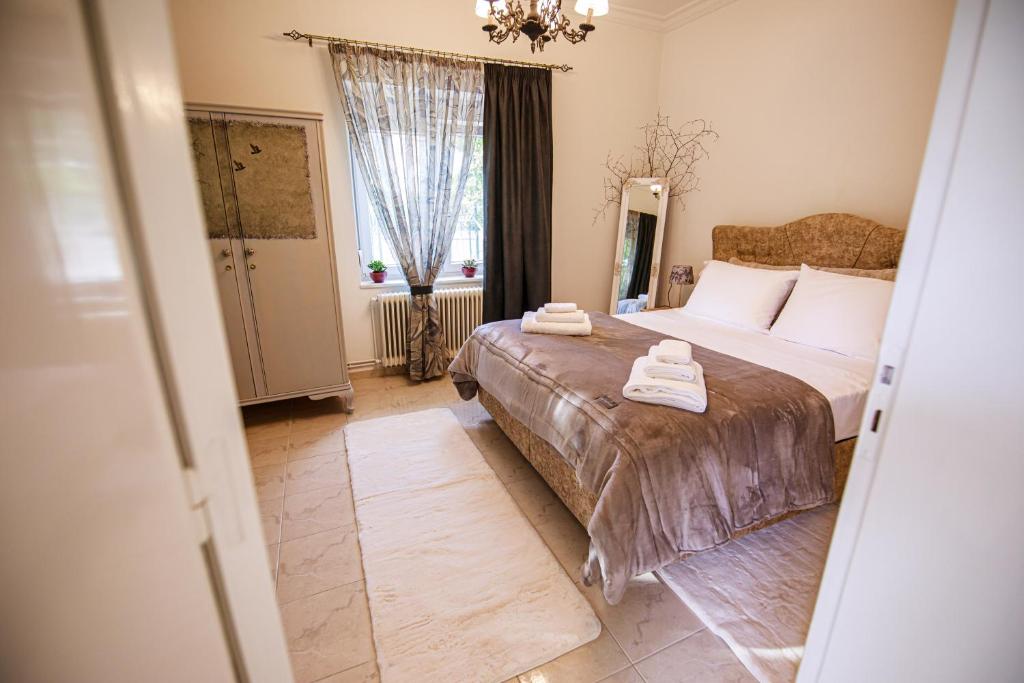 A bed or beds in a room at Stefania's Home