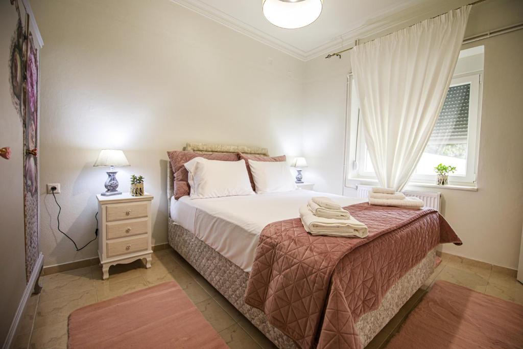 A bed or beds in a room at Stefania's Home