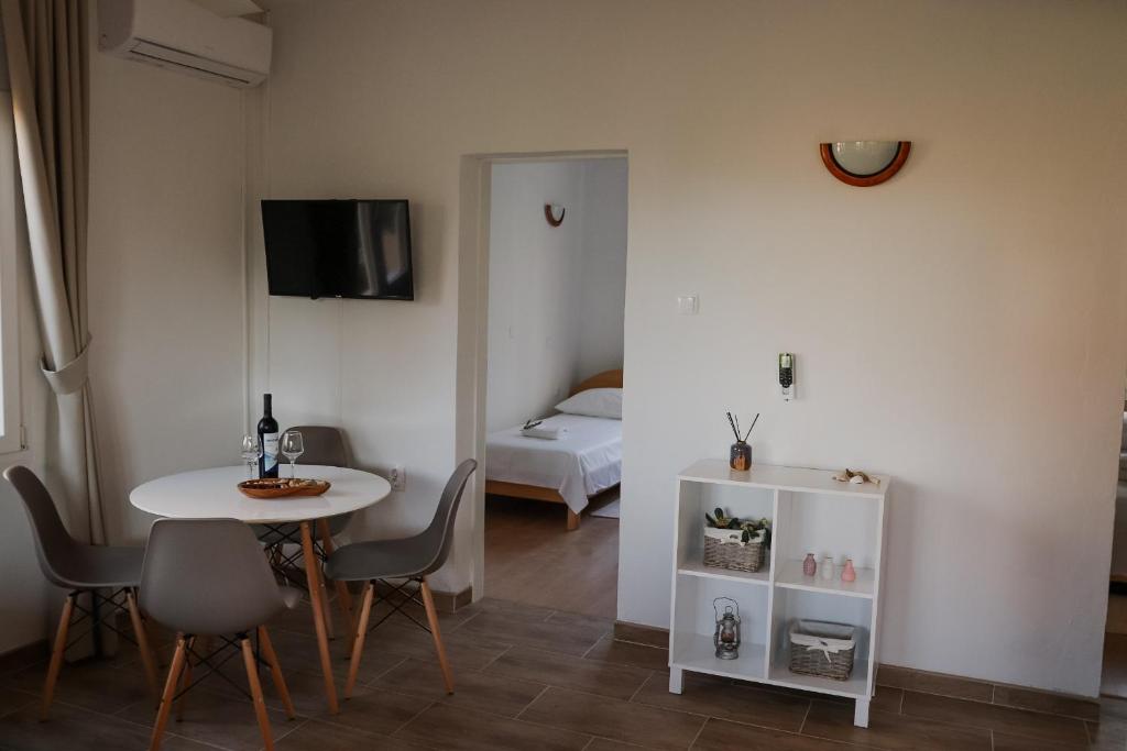 Posteľ alebo postele v izbe v ubytovaní Apartmani Rafaela