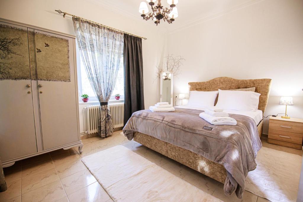 A bed or beds in a room at Stefania's Home