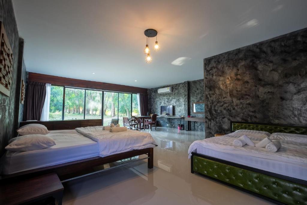 ชิดธาร รีสอร์ท - Standard Quadruple Room