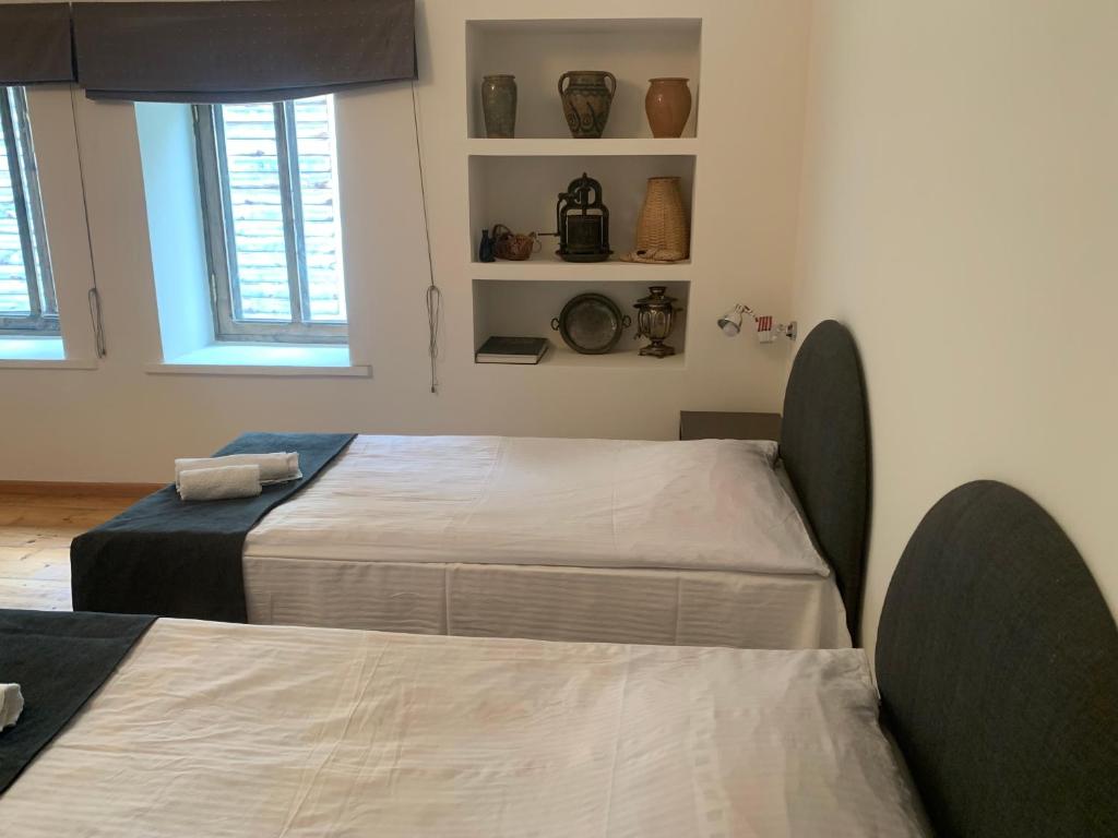 Postel nebo postele na pokoji v ubytování Hotel Lemi