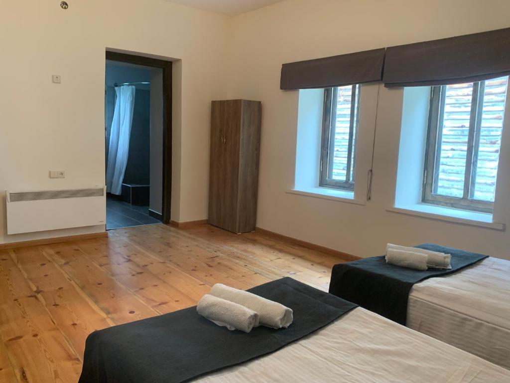 Postel nebo postele na pokoji v ubytování Hotel Lemi