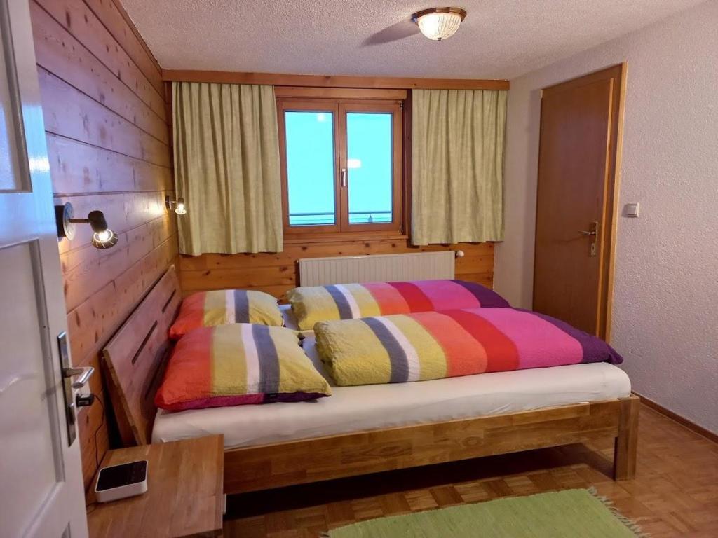 Postel nebo postele na pokoji v ubytování Ferienwohnung Stelzis