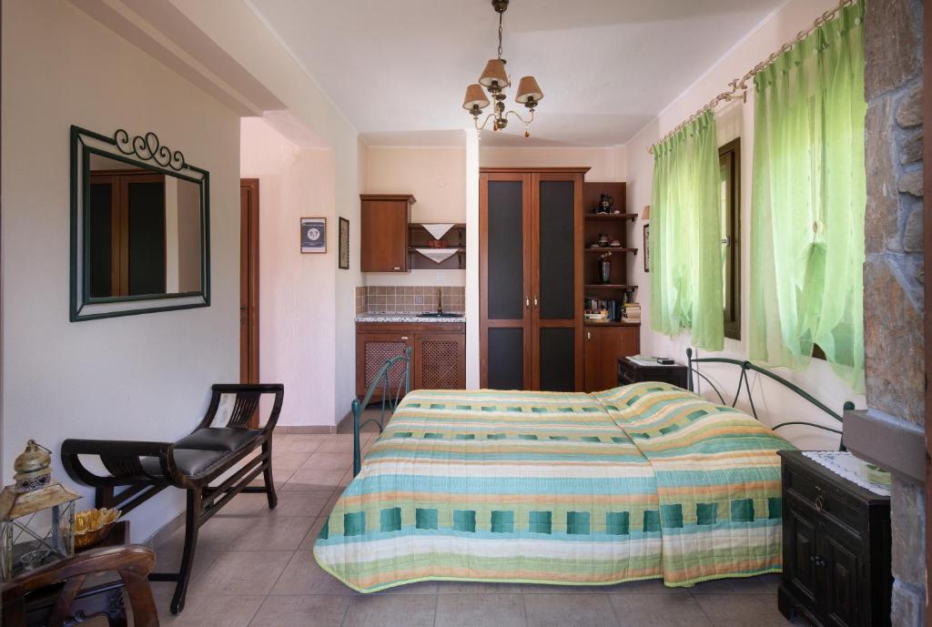 Postel nebo postele na pokoji v ubytování Chorostasi Guest House