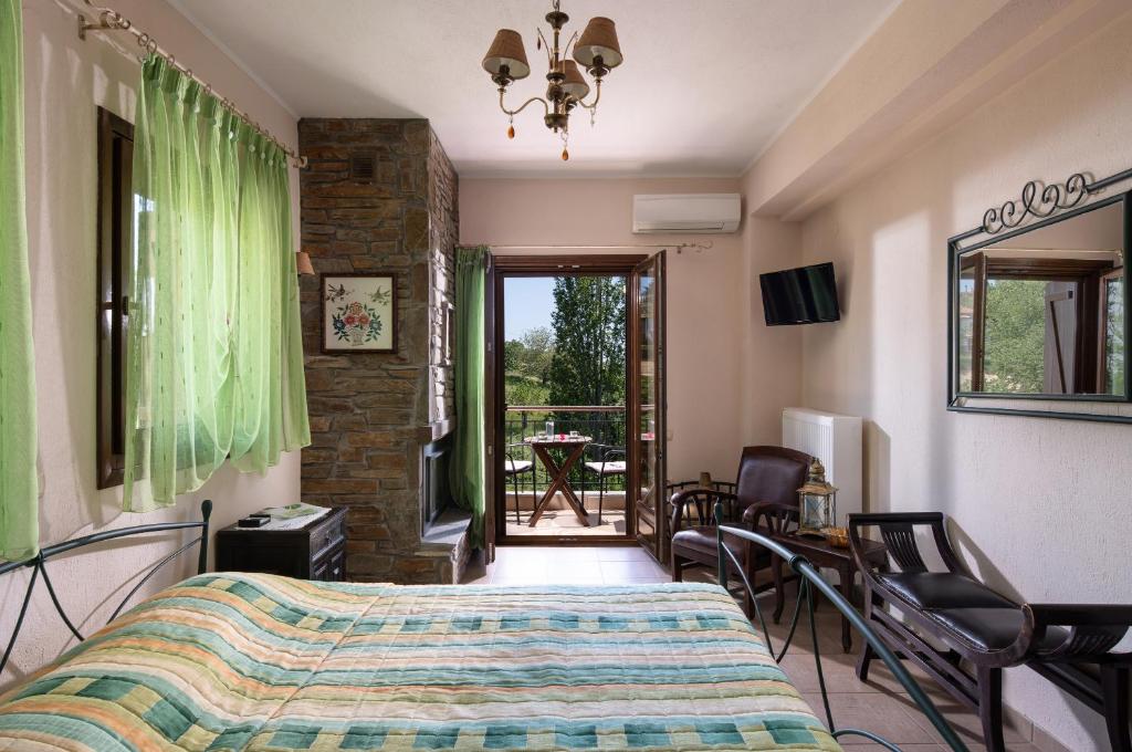 Postel nebo postele na pokoji v ubytování Chorostasi Guest House