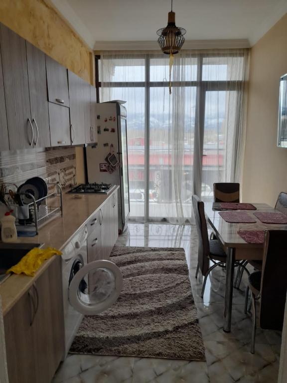 Kuchyň nebo kuchyňský kout v ubytování Guest House Kakha