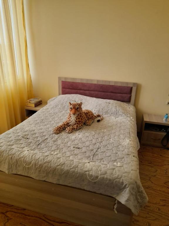 Postel nebo postele na pokoji v ubytování Guest House Kakha