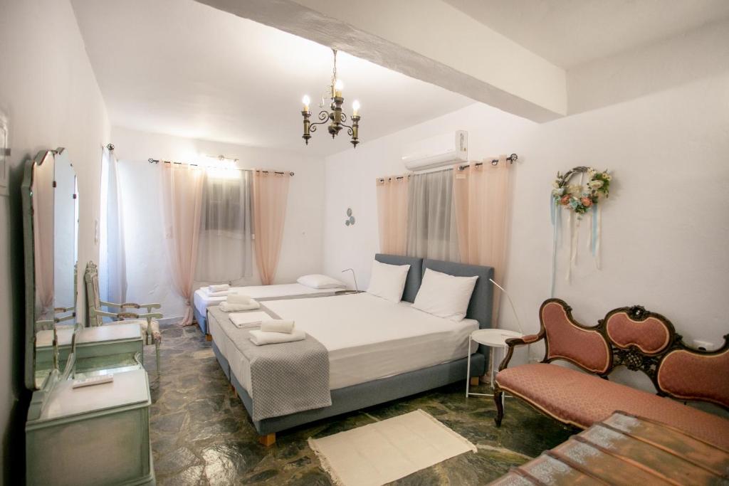 Postel nebo postele na pokoji v ubytování Mylos villa Mani