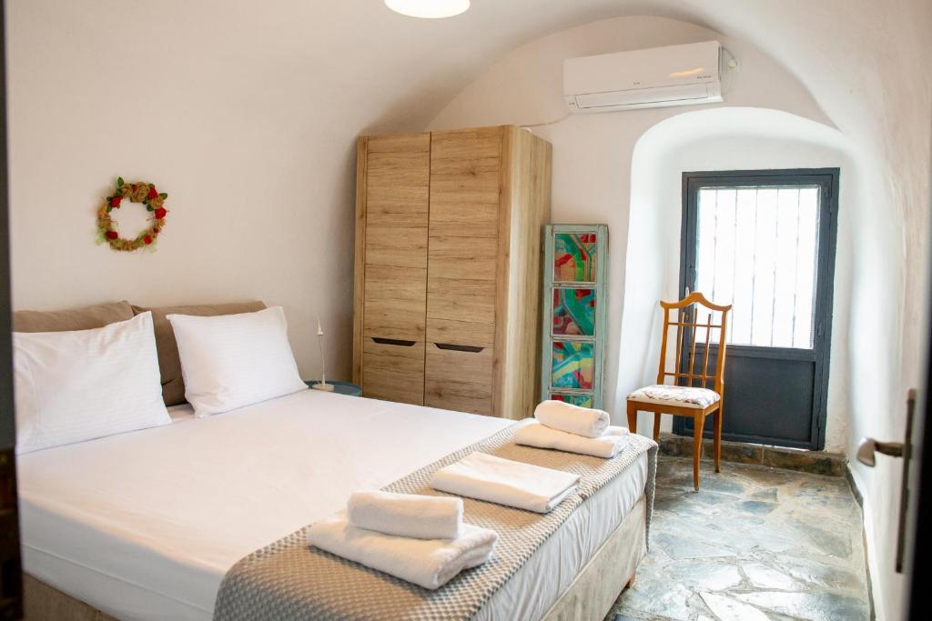Postel nebo postele na pokoji v ubytování Mylos villa Mani