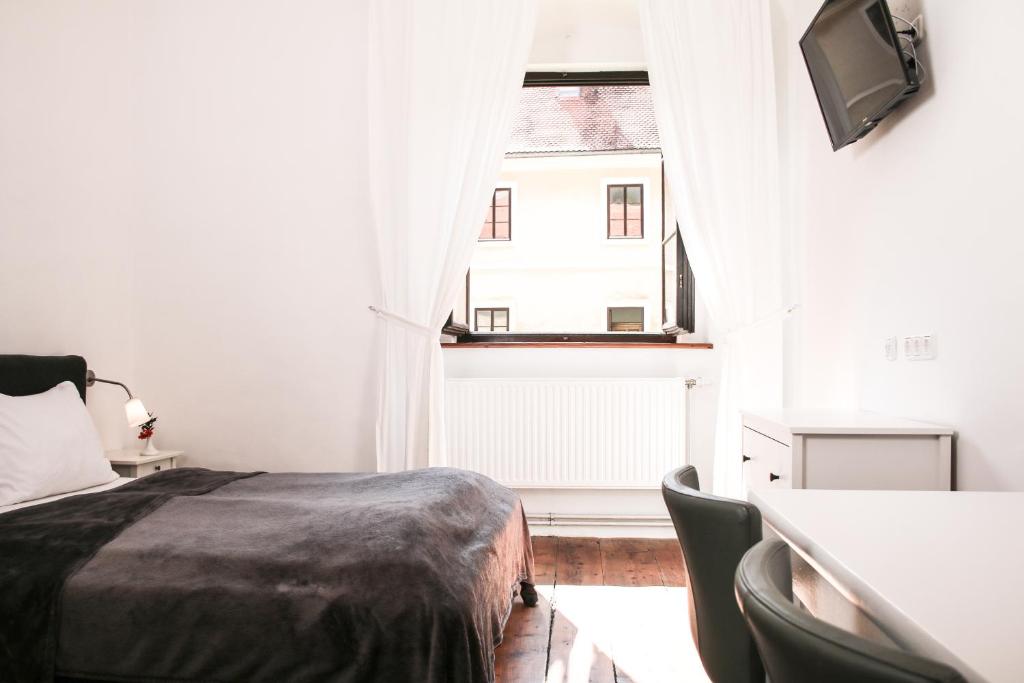 TV a/nebo společenská místnost v ubytování Hotel im Stift Neuberg