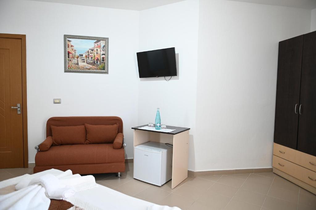 TV a/nebo společenská místnost v ubytování Vila Oxinn