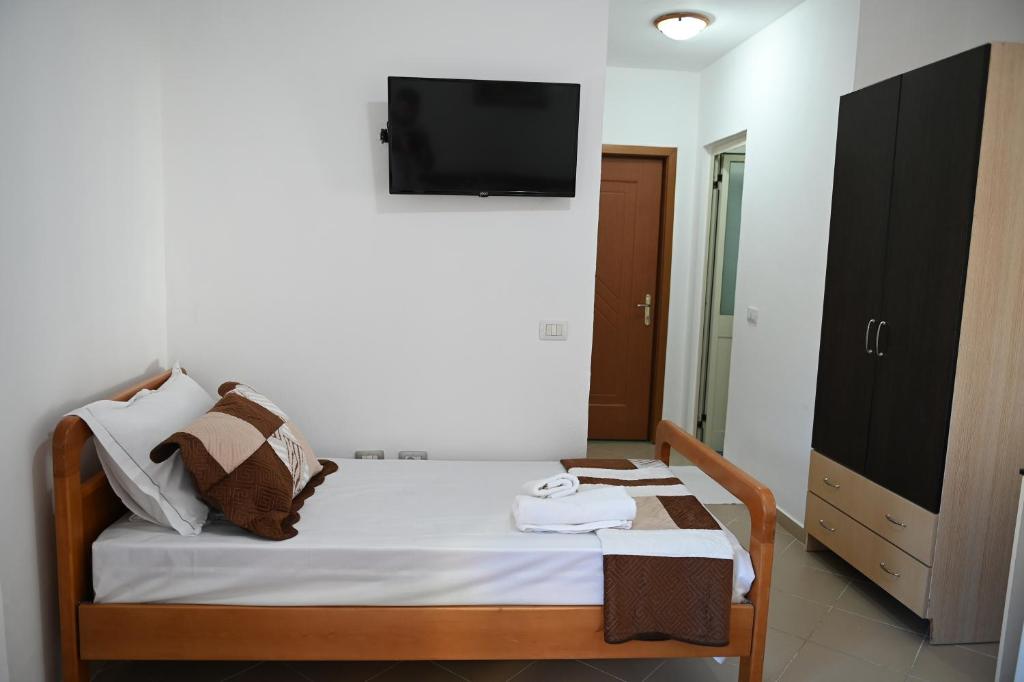 Postel nebo postele na pokoji v ubytování Vila Oxinn