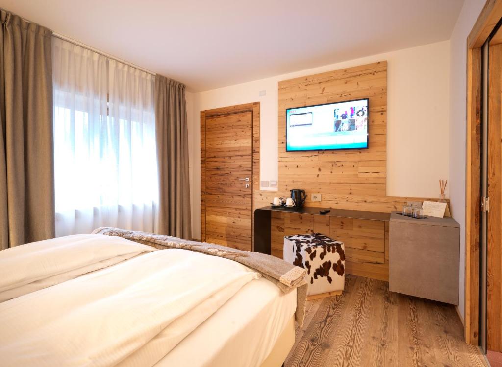 Posteľ alebo postele v izbe v ubytovaní RESORT VALFORMICA