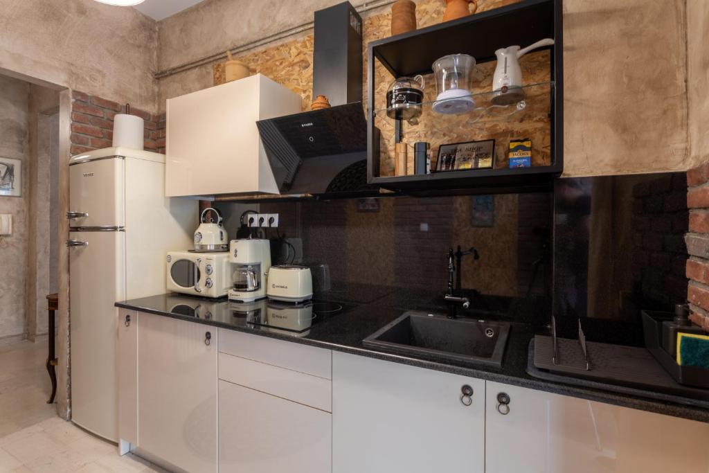 Kuchyňa alebo kuchynka v ubytovaní MS APARTMENT