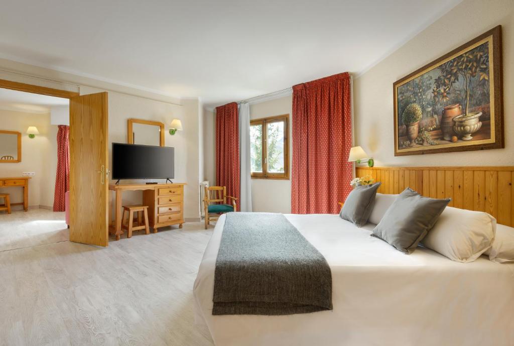 TV a/nebo společenská místnost v ubytování Hotel Nievesol