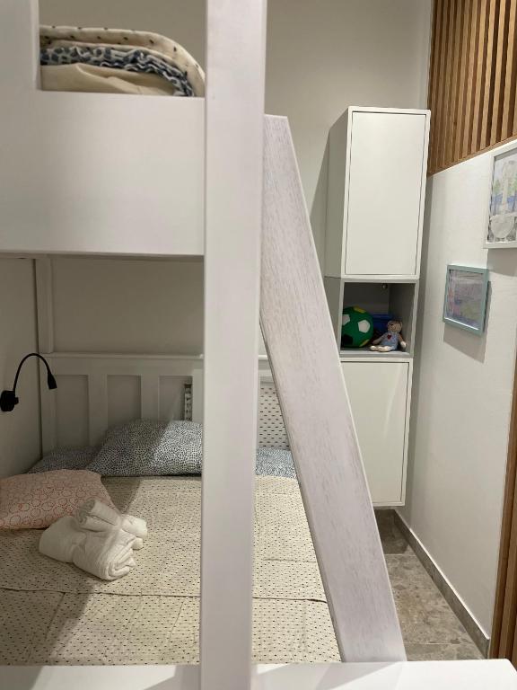 Postel nebo postele na pokoji v ubytování Ena Diva