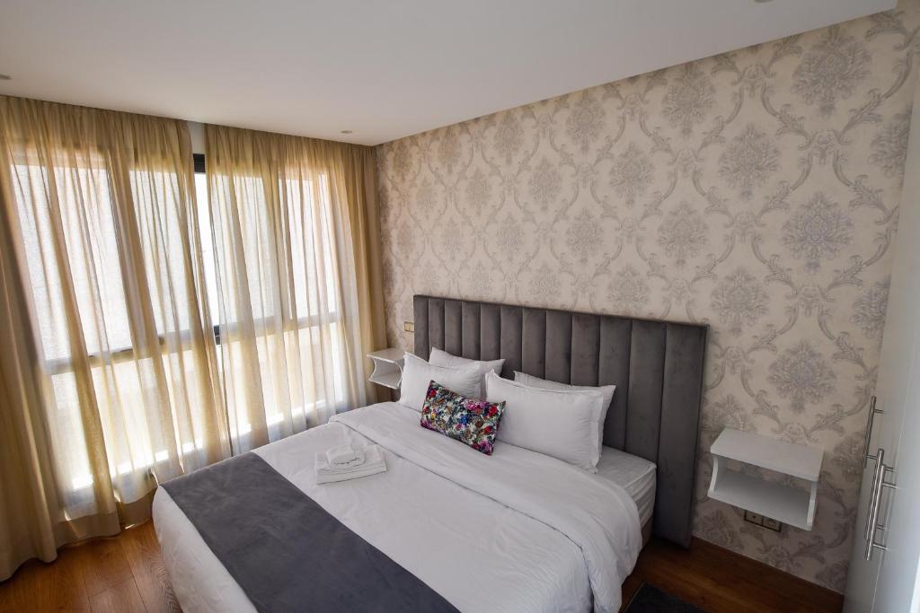 Postel nebo postele na pokoji v ubytování Family Aparthotel