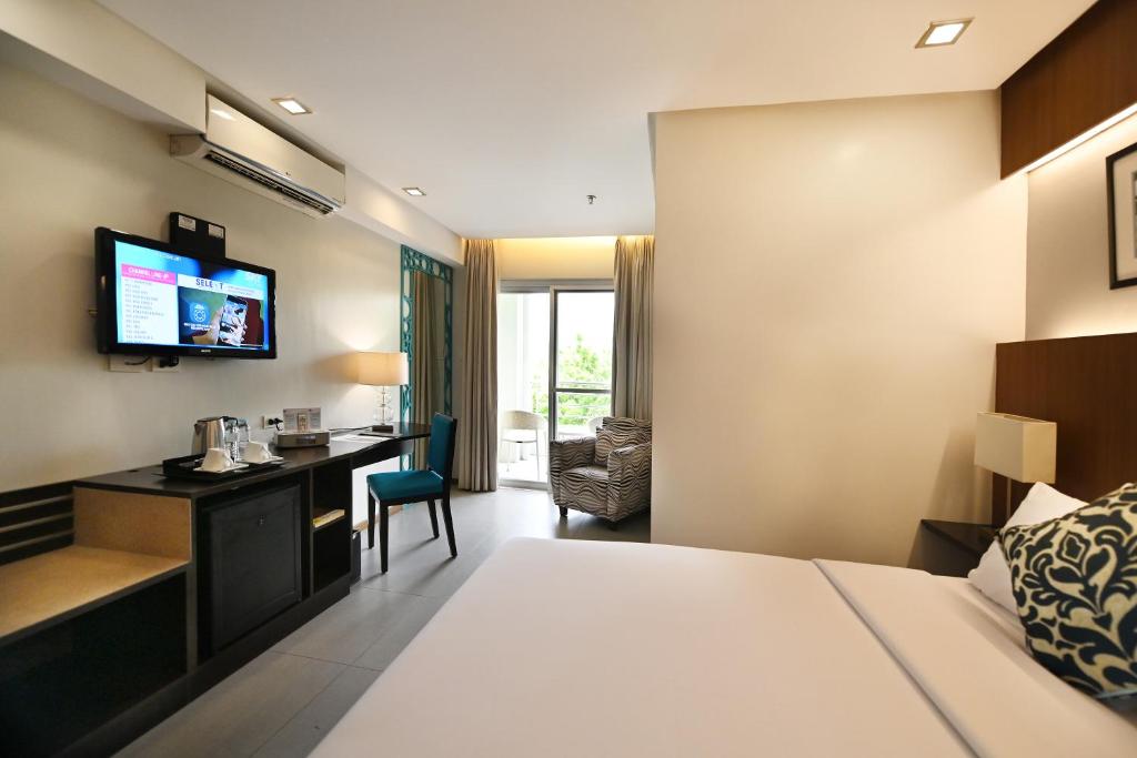 Postel nebo postele na pokoji v ubytování St Mark Hotel
