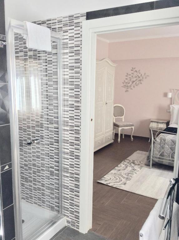 Postel nebo postele na pokoji v ubytování Il Castellaccio Bed & Breakfast