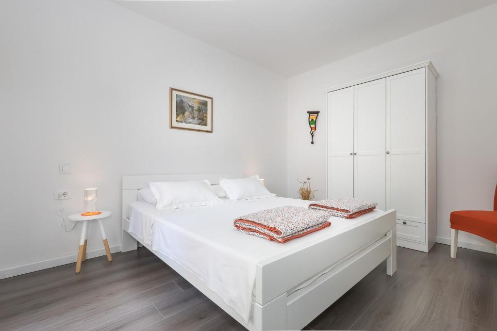 Voodi või voodid majutusasutuse Apartment M&J Supetar toas