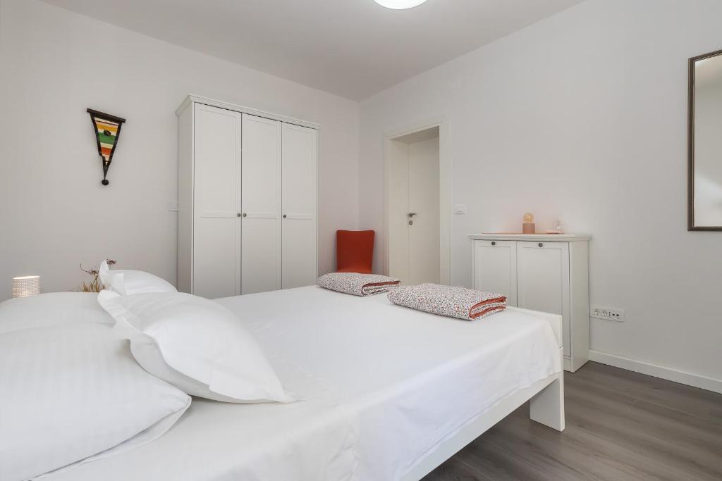 Voodi või voodid majutusasutuse Apartment M&J Supetar toas