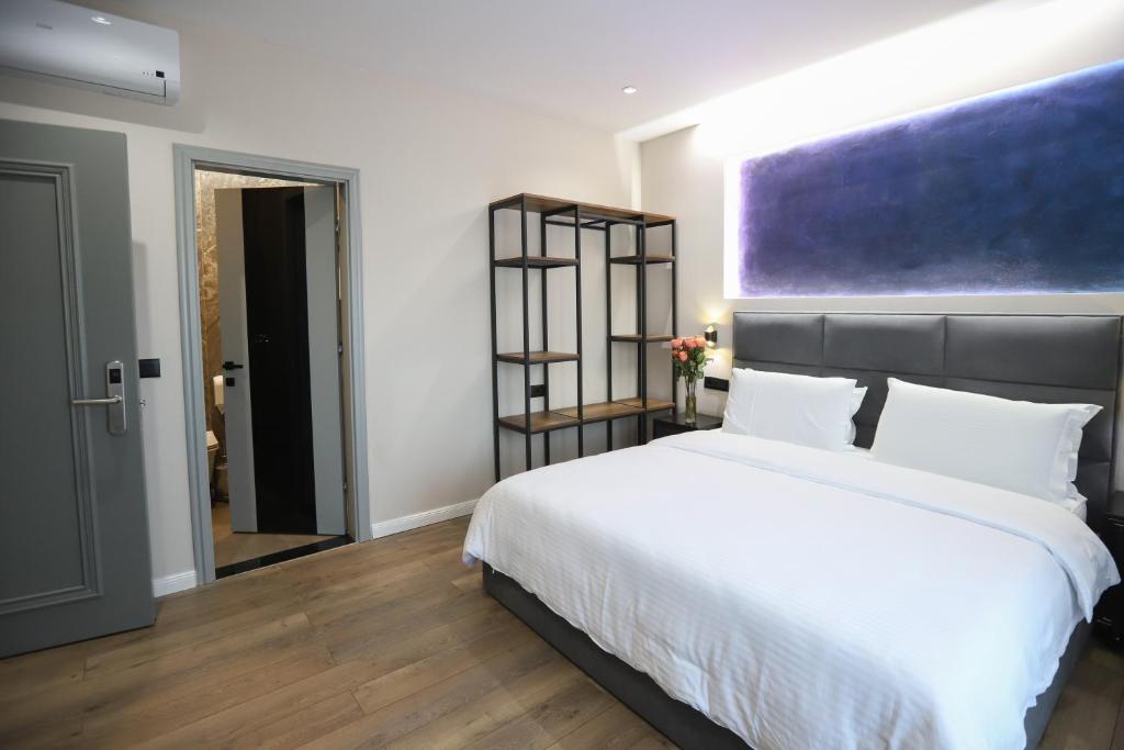 Postel nebo postele na pokoji v ubytování Imperator Hotel
