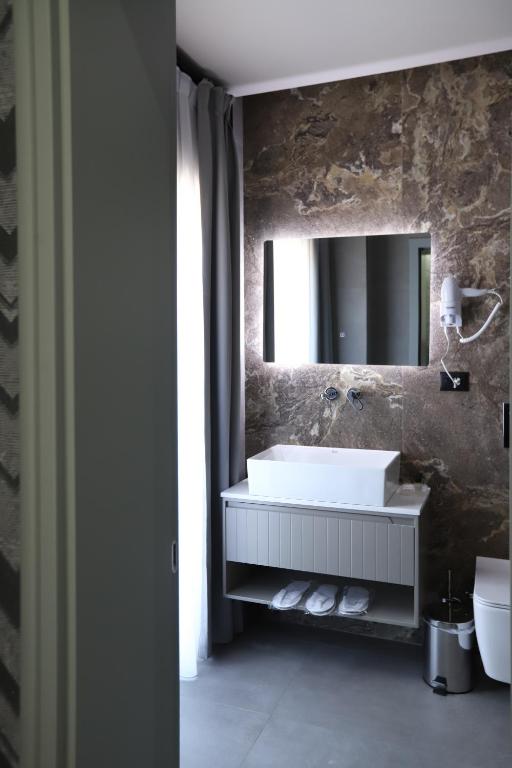 Postel nebo postele na pokoji v ubytování Imperator Hotel