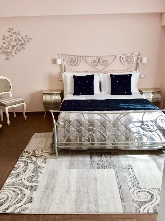 Postel nebo postele na pokoji v ubytování Il Castellaccio Bed & Breakfast