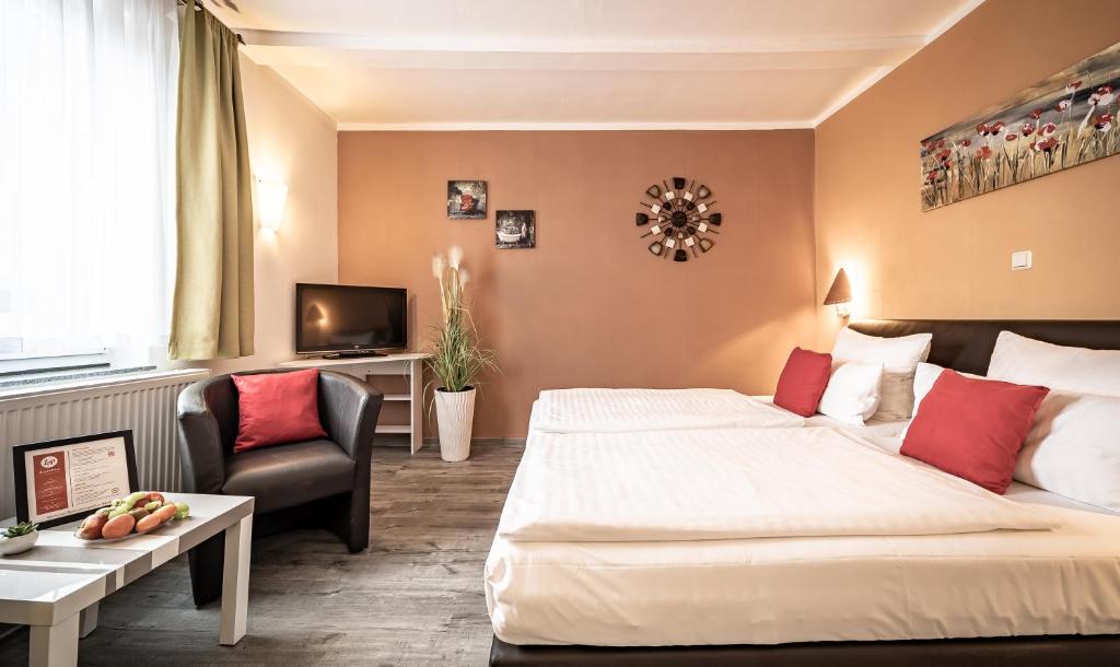 TV a/nebo společenská místnost v ubytování Le petit Palais - Hotel/Pension