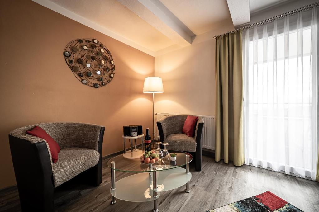 Posezení v ubytování Le petit Palais - Hotel/Pension