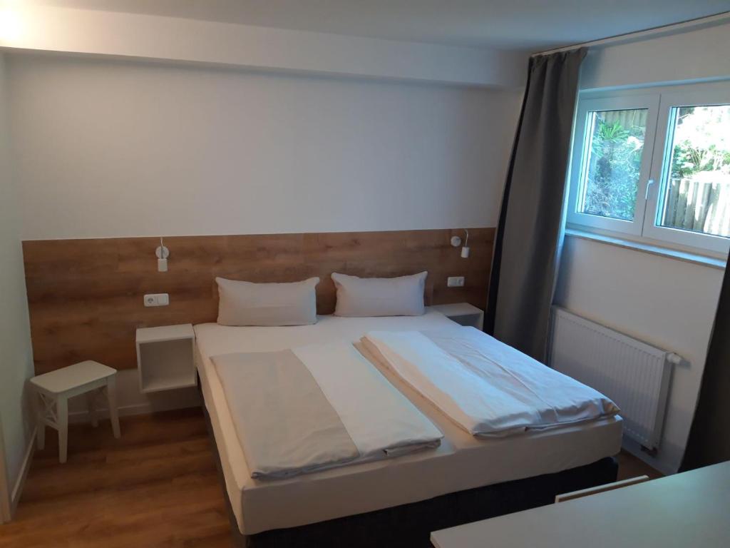 Letto o letti in una camera di Hotel Weinert