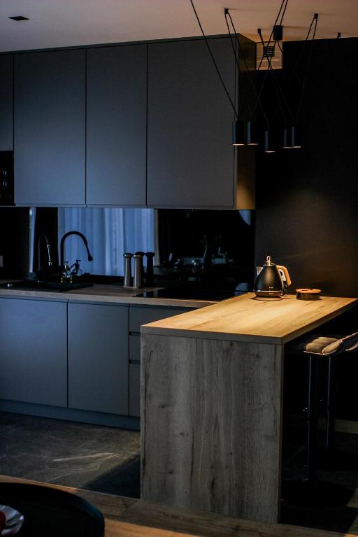Kuchyňa alebo kuchynka v ubytovaní Apartamenty STUDIO