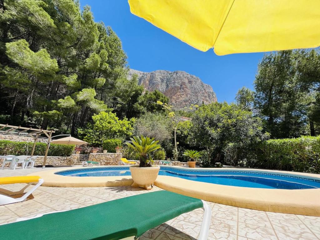 Bazén v ubytování Casa de vacaciones con piscina privada, aire acondicionado, WiFi y aparcamiento en Javea - ES-160-12 nebo v jeho okolí