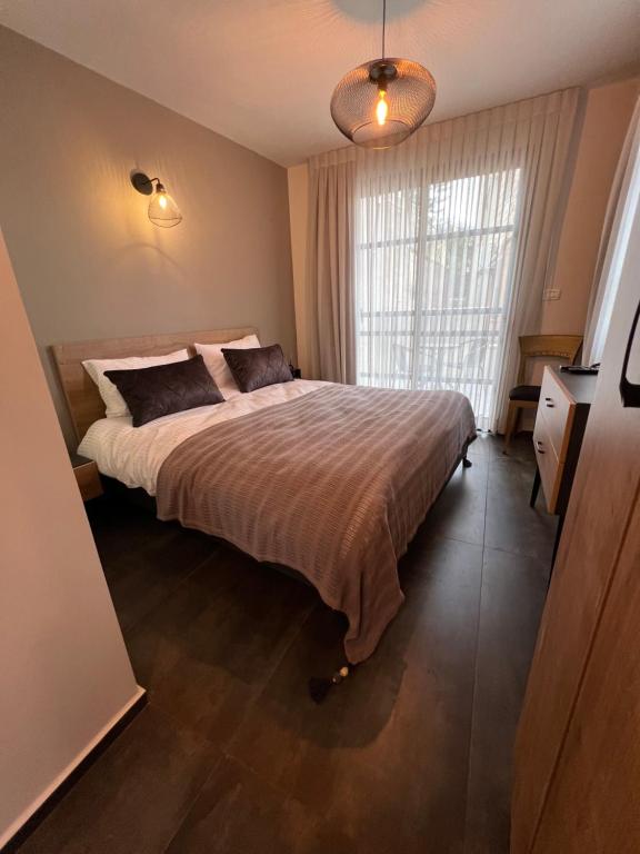 Ένα ή περισσότερα κρεβάτια σε δωμάτιο στο Abu Salem house guest house