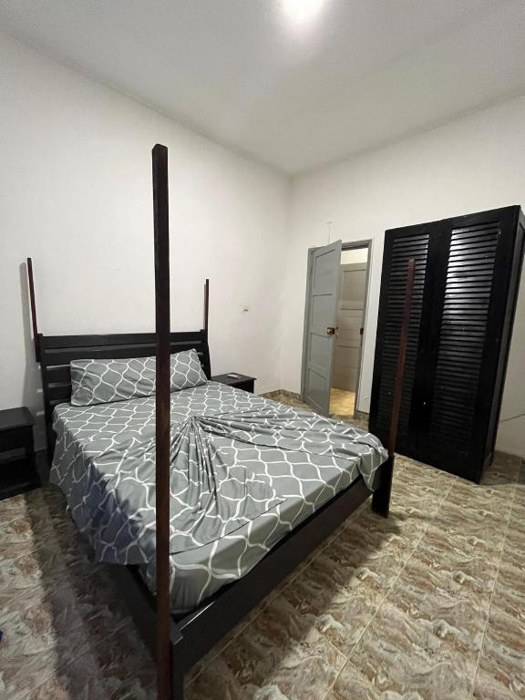 Postel nebo postele na pokoji v ubytování J Nova LDA