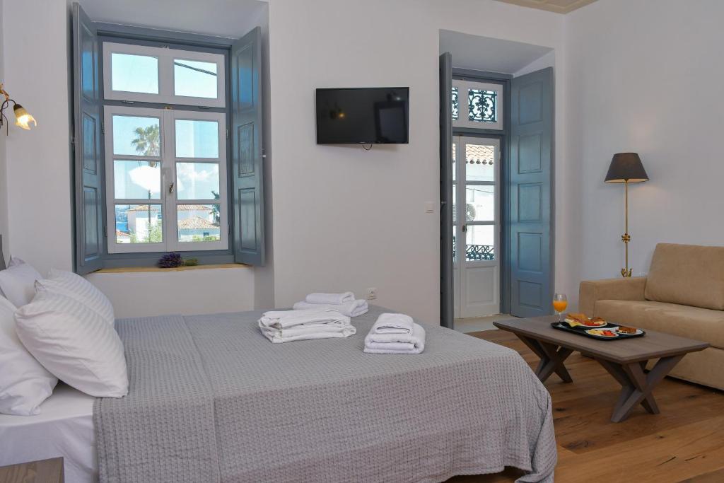 Postel nebo postele na pokoji v ubytování Mansion Dasi