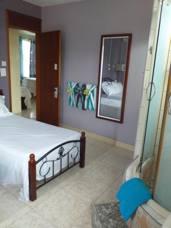 Postel nebo postele na pokoji v ubytování Tyvabro Guesthouse