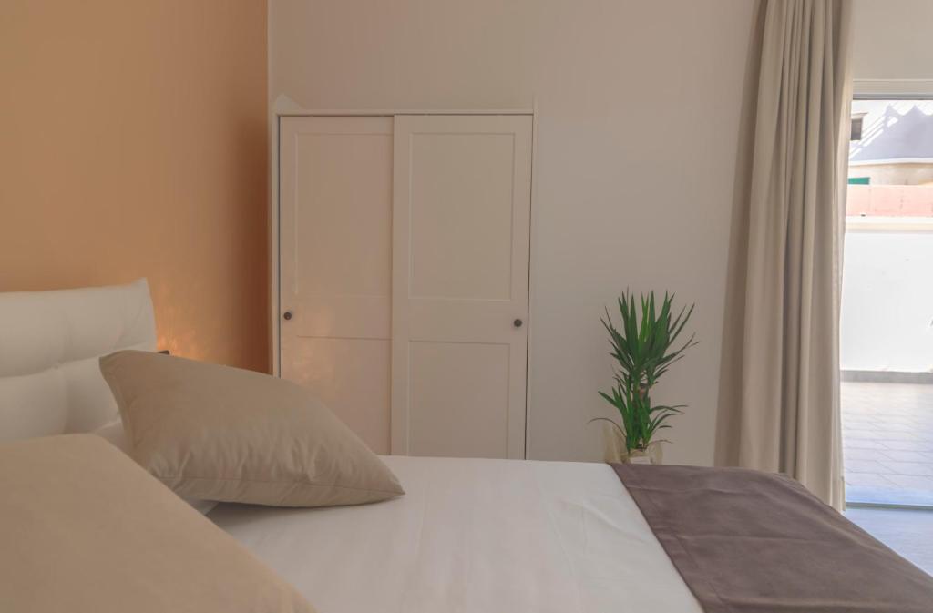 Postel nebo postele na pokoji v ubytování Althea B&B a Reggio Calabria