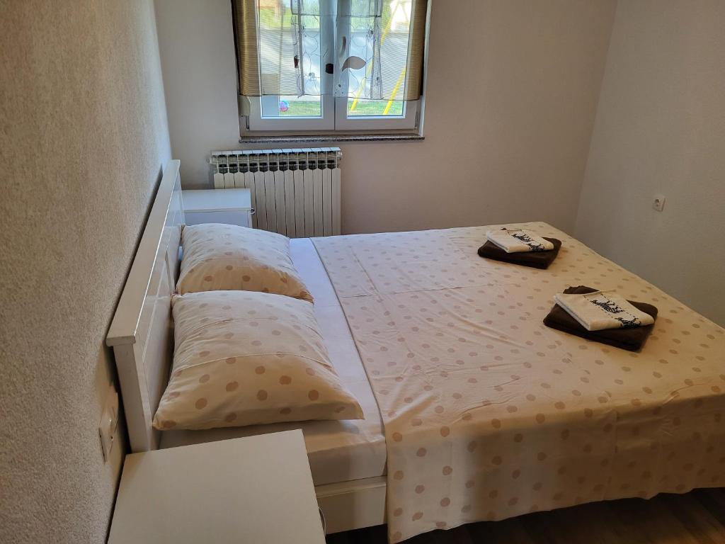 A bed or beds in a room at Apartment Mario