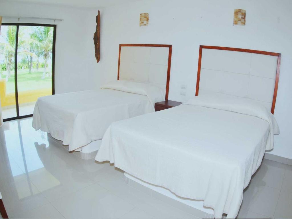 Postel nebo postele na pokoji v ubytování Hotel Istirinchá