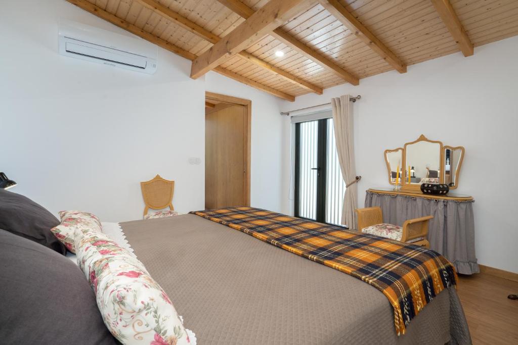 Postel nebo postele na pokoji v ubytování Quinta De Fundevila -quinta privada