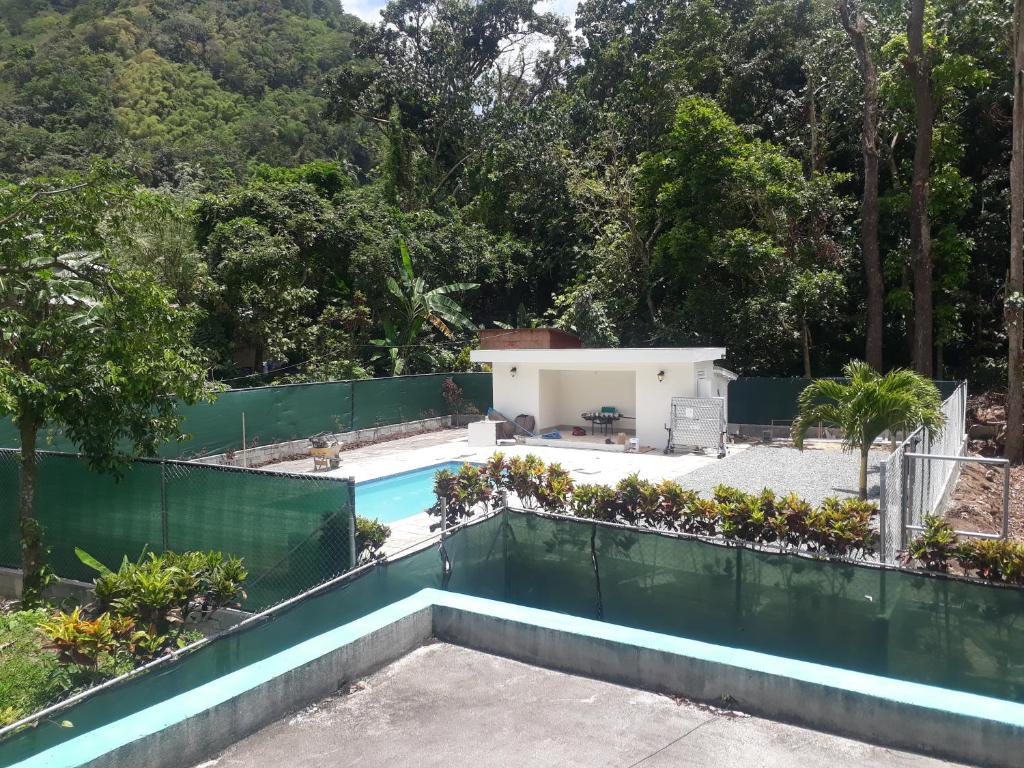 Bazén v ubytování Amazon Villas nebo v jeho okolí