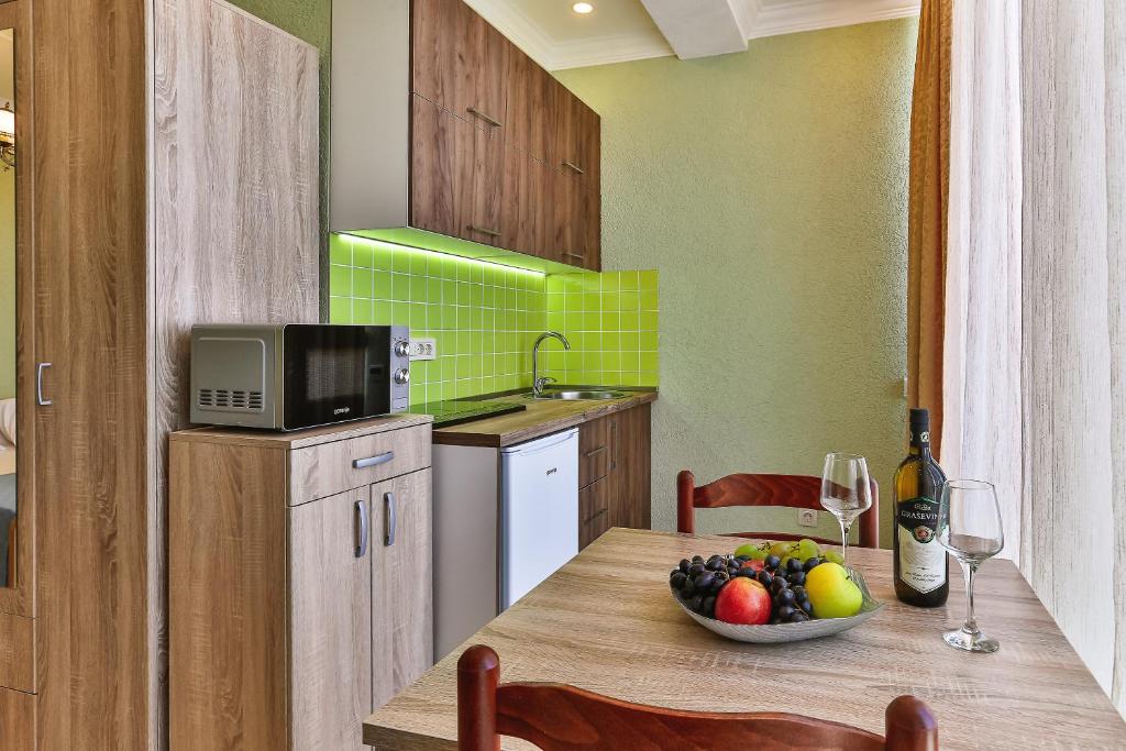 Kuchyň nebo kuchyňský kout v ubytování DreamSea Apartment
