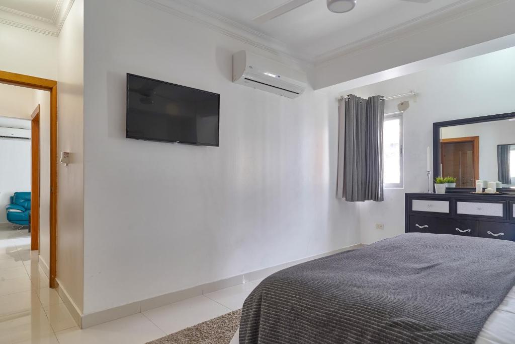 Postel nebo postele na pokoji v ubytování Apartamento en zona privilegiada de Santo Domingo RD