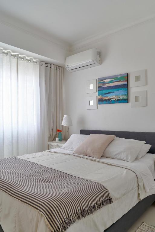 Postel nebo postele na pokoji v ubytování Apartamento en zona privilegiada de Santo Domingo RD