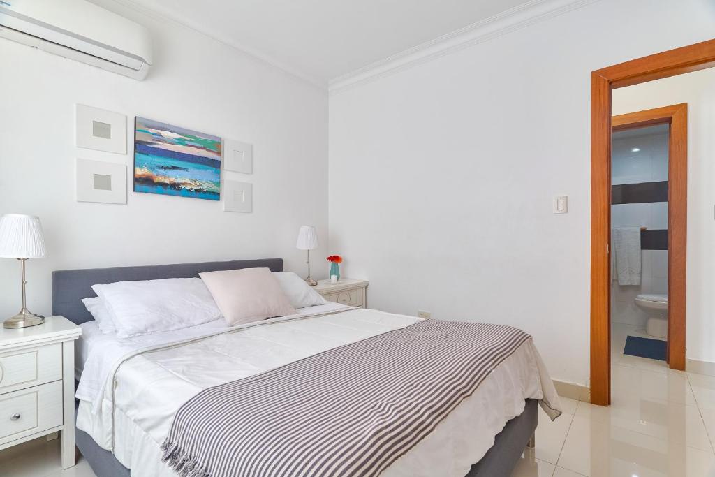 Postel nebo postele na pokoji v ubytování Apartamento en zona privilegiada de Santo Domingo RD