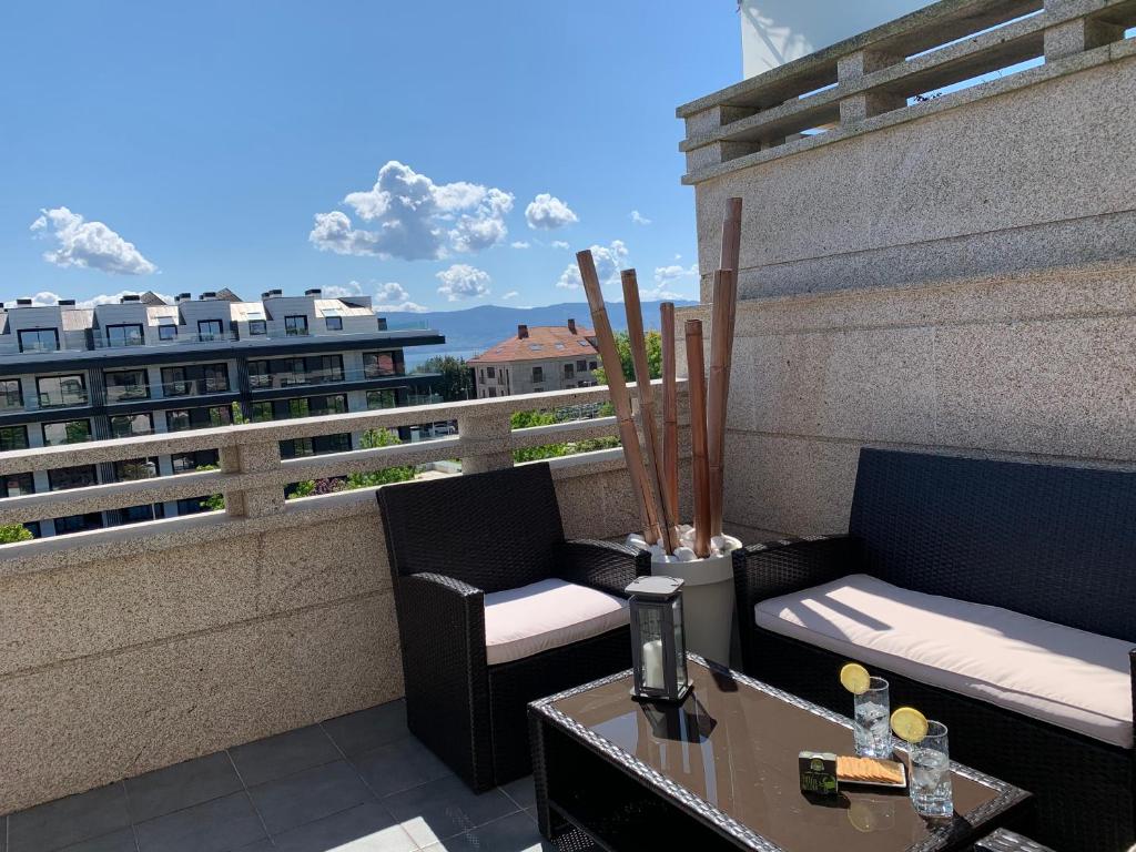 Balkón nebo terasa v ubytování CANELAS SUITES ÁTICO Amplias Terrazas